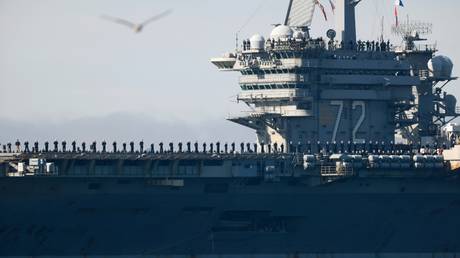Burned-out US aircraft carrier sailors near Iran tried to jump overboard – media - by IRONaadmi August 13, 2026